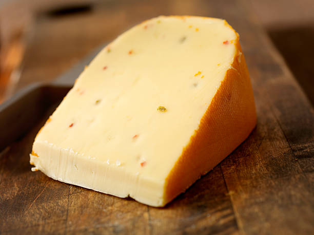 Spiced Gouda Spiced Gouda -Photographed on Hasselblad H3D2-39mb Camera gouda cheese stock pictures, royalty-free photos & images