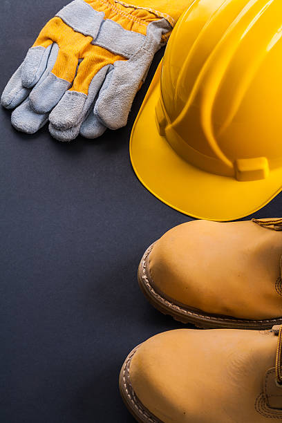 istock safety working wear construction helmet protective gloves workin 476144512