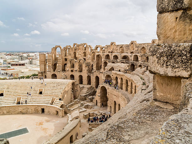 ruins of ancient colosseum in North Africa stock photo