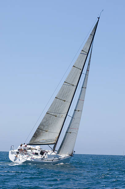 istock Sailboat Racing In The Blue Ocean Against Sky 476146547