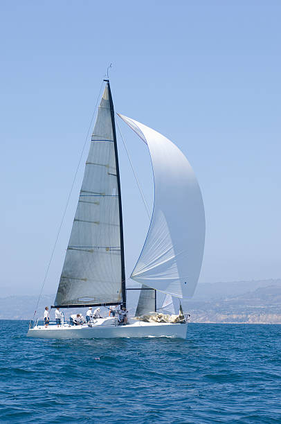 istock Sailboat Racing In The Blue Ocean Against Sky 476146549