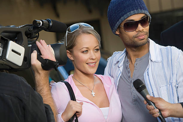 istock Celebrity Couple And Paparazzi 476147397