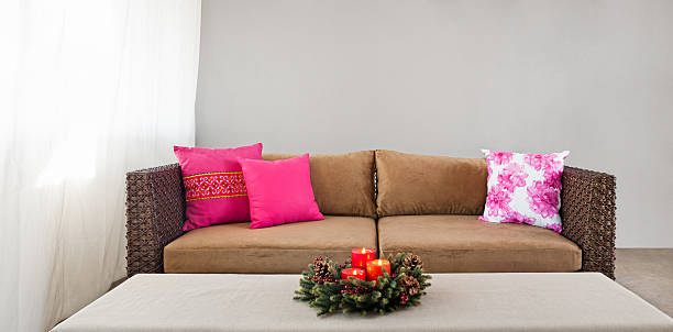 istock Beige sofa with advent flower arangement 476147455