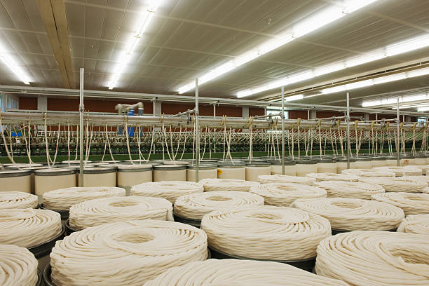 istock Cotton Roll At Spinning Factory 476150539