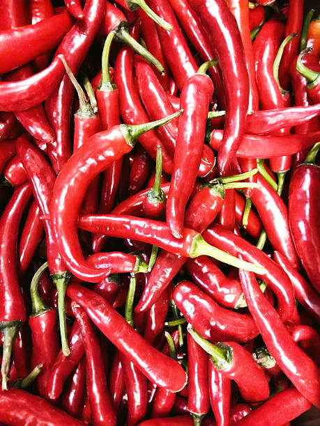 istock Red hot chili peppers background 476150678