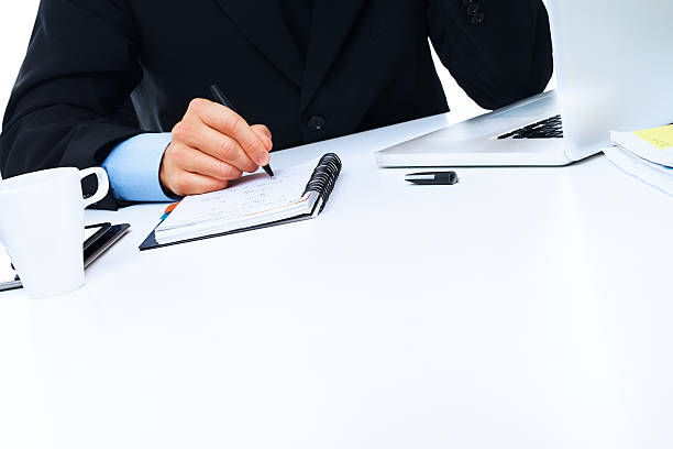 Close up business man signing contract making a deal
