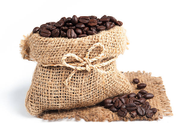 istock Coffee beans in canvas sack on white background 476155722
