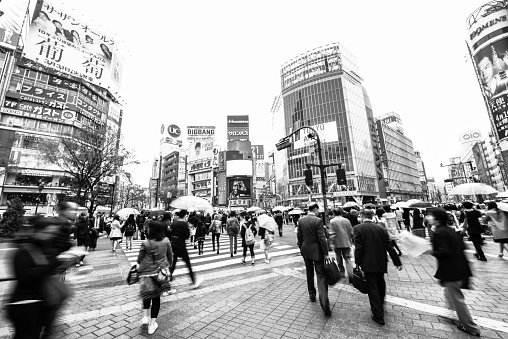 Tokyo, Japan - April 1 2015: Motion of people on Shibuya crossing