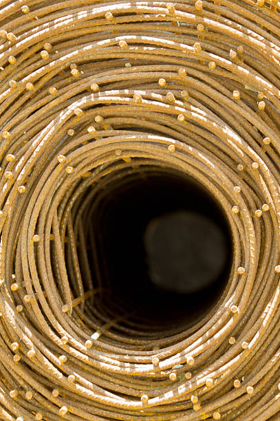 istock Roll of rusty steel wire mesh for construction. 476158386
