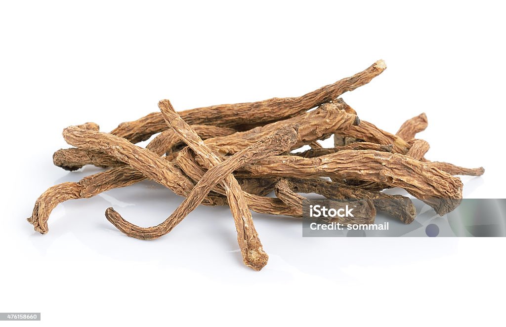 angelica sinensis herb on white background Root Stock Photo