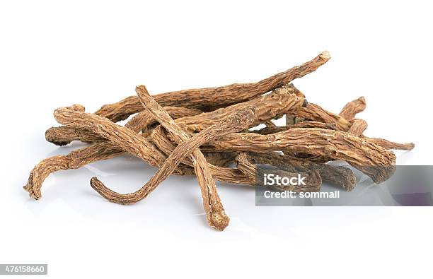 Angelica Sinensis Herb On White Background Stock Photo - Download Image Now - Root, Angelica, 2015