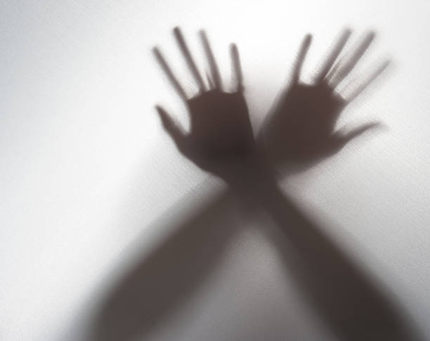 istock Silhouette of a hand in the back light,blur image 476159862