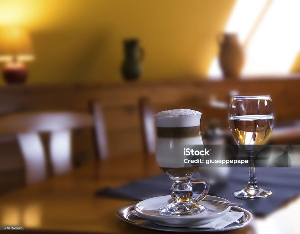 Traditional Italian macchiato Traditional Italian macchiato with caramel in coffee shop Assistant Stock Photo