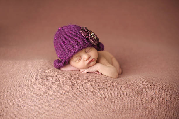 istock Newborn Girl in Knit hat 476164023