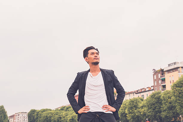istock Handsome Asian model posing in the city streets 476164136