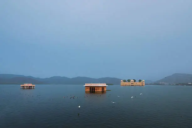 The Waterpalace, built in pink sandstone, is situated in a lake in the pink city of Jaipur in Rajasthan, India. The Jal Mahal Water Palace in Jaipur, India. Rajasthan landmark - Jal Mahal (Water Palace) on Man Sagar Lake in the evening in twilight. Jaipur, Rajasthan, India