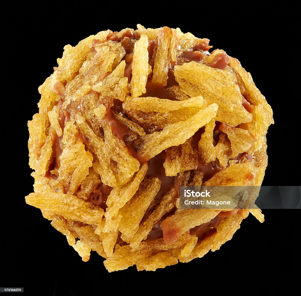 Chocolate praline covered with dried apples 2015 Stock Photo