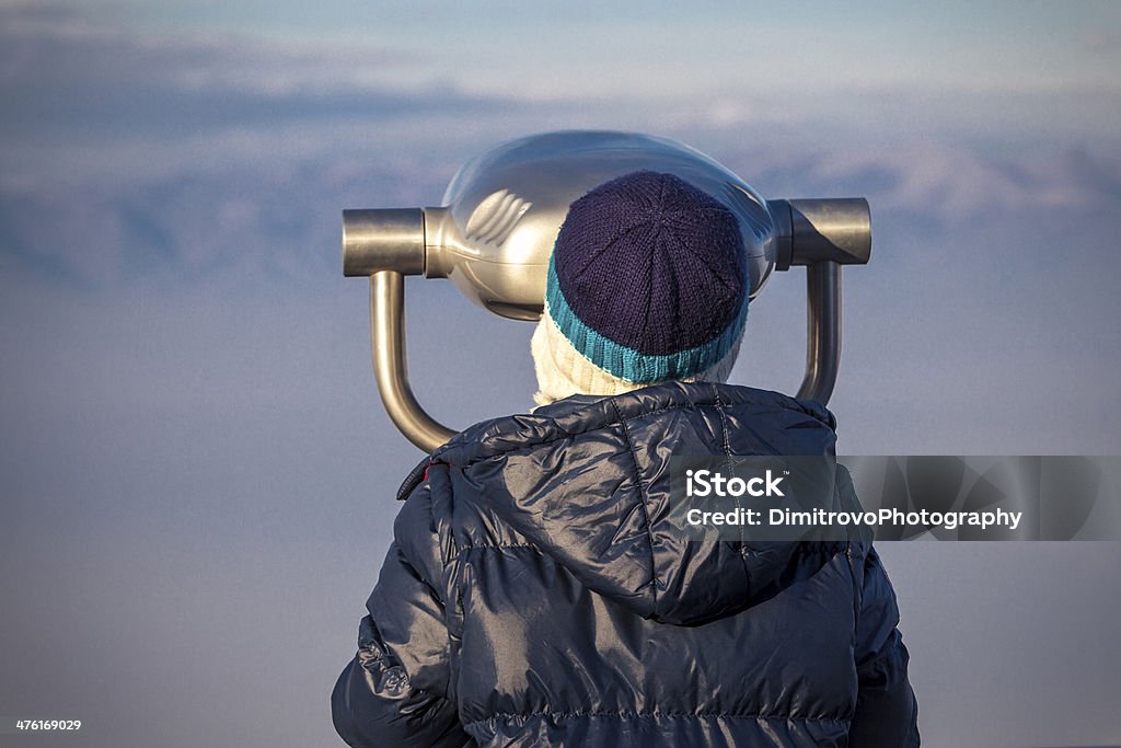 Boy Struggles To See Through Coin-operated Binoculars 6-7 Years Stock Photo