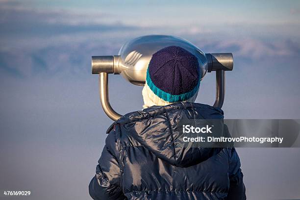 Boy Struggles To See Through Coinoperated Binoculars Stock Photo - Download Image Now