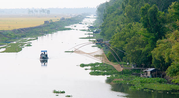 istock Cargo boat floating on the Mekong river 476169648