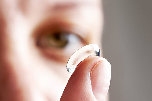 istock Young woman with contact lens 476173574