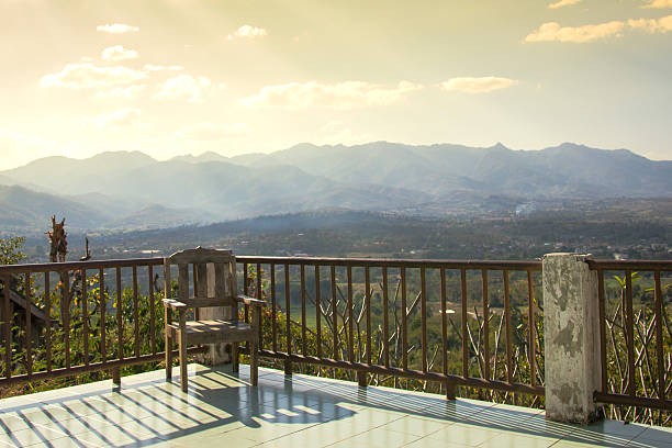 istock Chair on Balcony over City View 476173627
