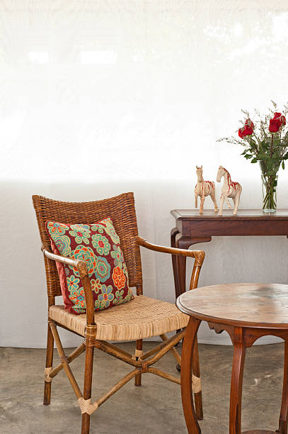istock Rattan chair in lounge setting 476173785