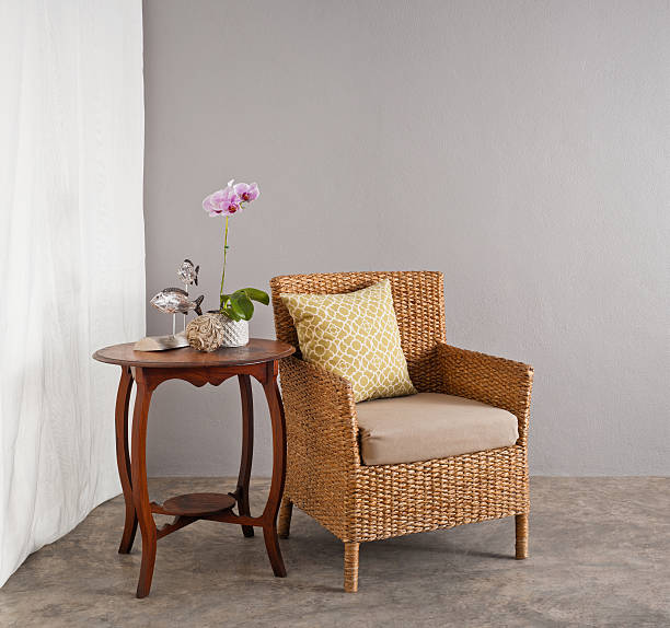 istock Rattan chair in lounge setting 476174945