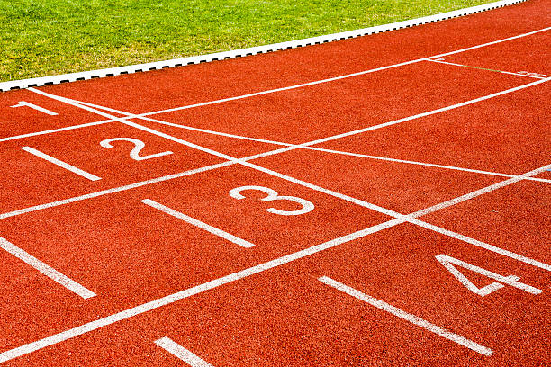 istock White lines and numbers on the stadiums track. 476181345