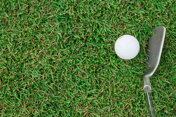 istock Golf club and ball in grass 476184246