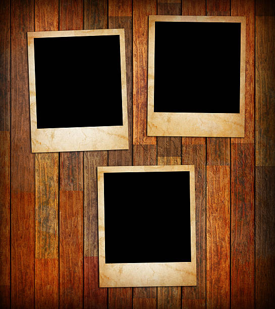 istock Grunge vintage photo frames on a wood 476193061