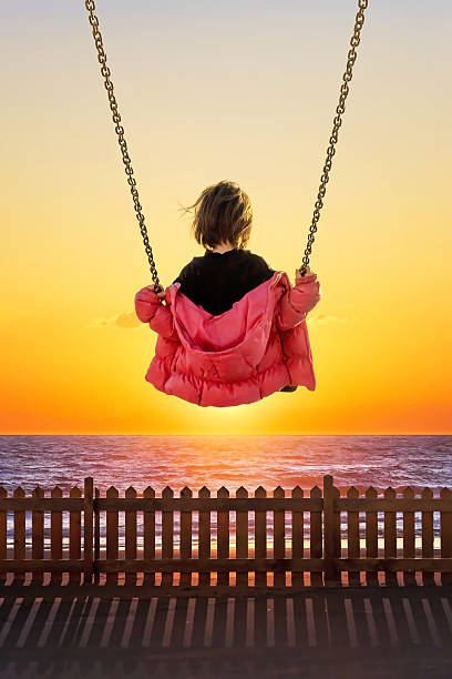 istock Little girl on the swing 476193810