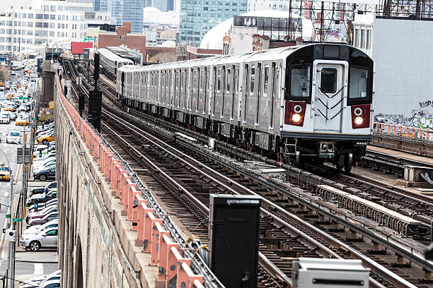 istock Subway Train Speeding on Elevated Track in Queens, New York 476196242