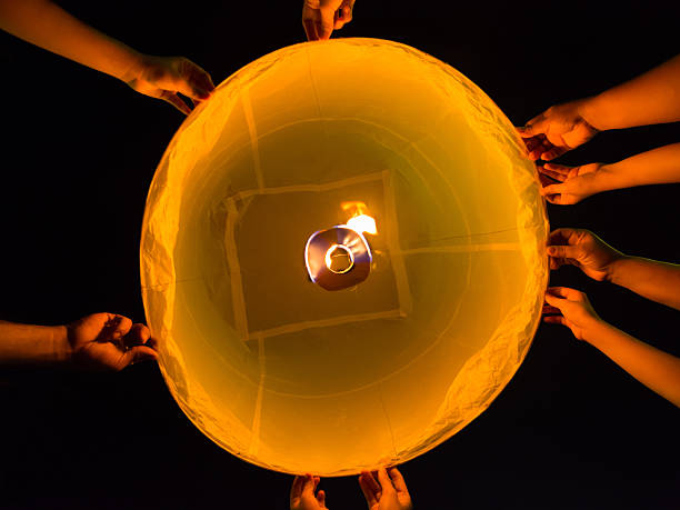 istock hands and firework for Loi Krathong Festival in Thailand 476196281
