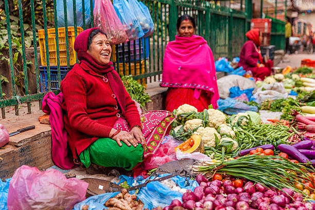 Indian street sellers in Kathmandu, Nepal Indian street  sellers selling vegetables on the streets of Kathmandu, Nepal.http://bem.2be.pl/IS/nepal_380.jpg nepalese culture stock pictures, royalty-free photos & images