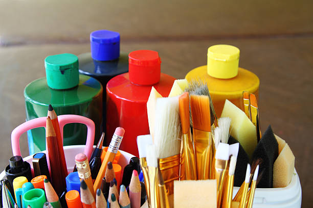 istock Paintbrushes, colored pencils and art paint 476196862