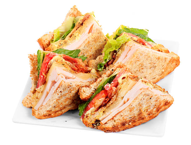 kanapka chicken club - portion turkey sandwich close up zdjęcia i obrazy z banku zdjęć