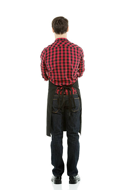 istock Rear view of a young man in apron 476197139