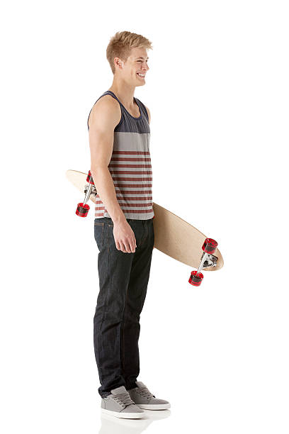 istock Smiling young man with a skateboard 476197483