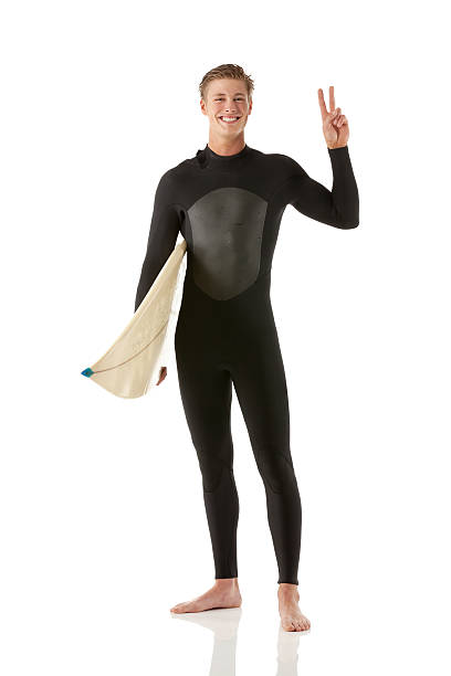 istock Sports man carrying surfboard 476199444