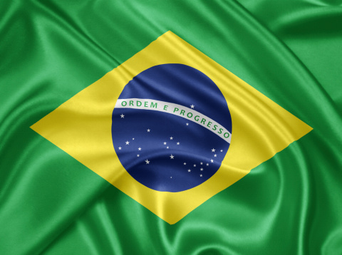 Flag of Brazil waving with highly detailed textile texture pattern