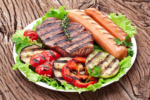 istock Grilled steak,sausages and vegetables. 476202163