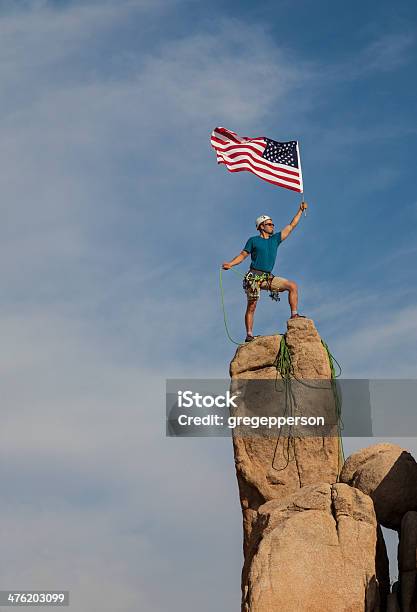 Successful Climber At The Top Stock Photo - Download Image Now - American Flag, Mountain Climbing, Achievement