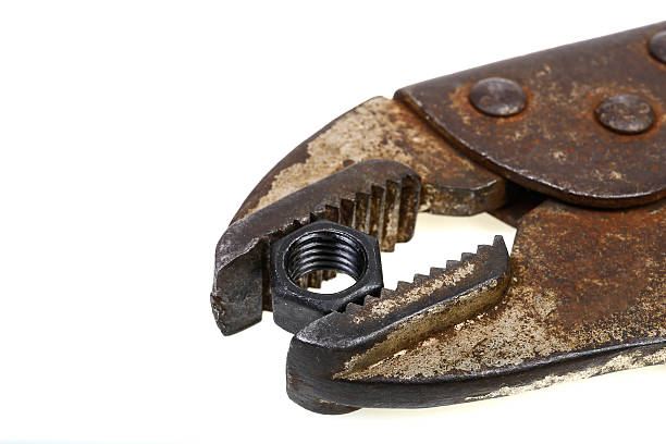 close-up old lock pliers and nut close-up old lock pliers and nut knurl stock pictures, royalty-free photos & images