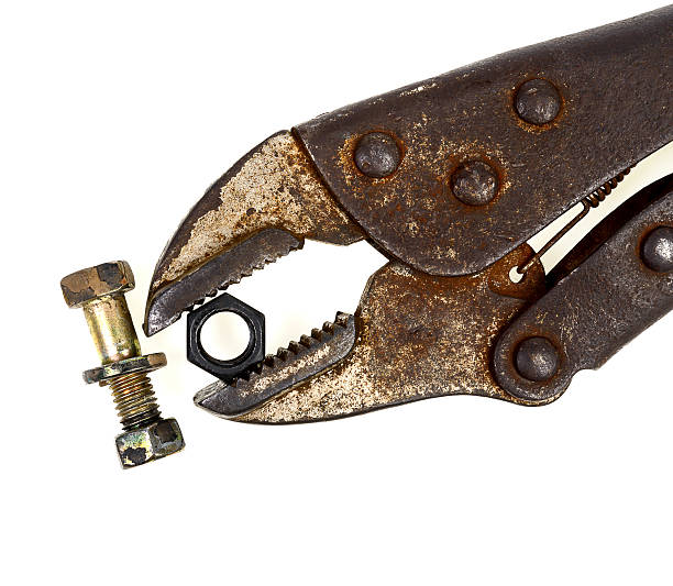 close-up old lock pliers and nut close-up old lock pliers and nut knurl stock pictures, royalty-free photos & images