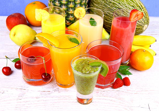 istock Fruit juice with kiwi, cherry, melon, tangerine, pear, apricot 476204175