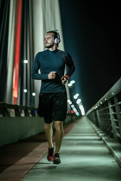 istock late night run outdoors 476204586