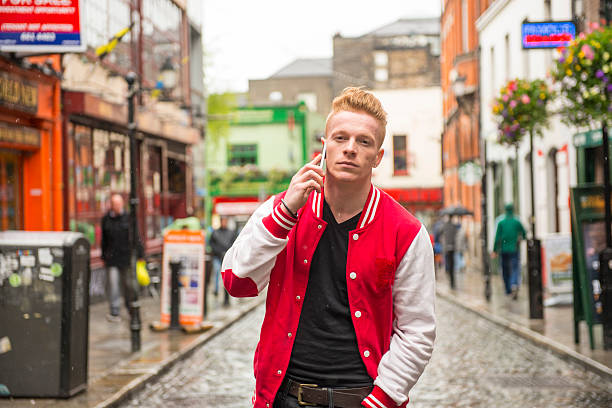 istock Young man on his phone in the city 476205172