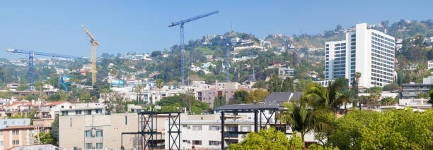 istock West Hollywood hills panoramic skyline with construction cranes 476205546