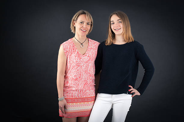 istock Beautiful family doing different expressions in different sets of clothes 476205814